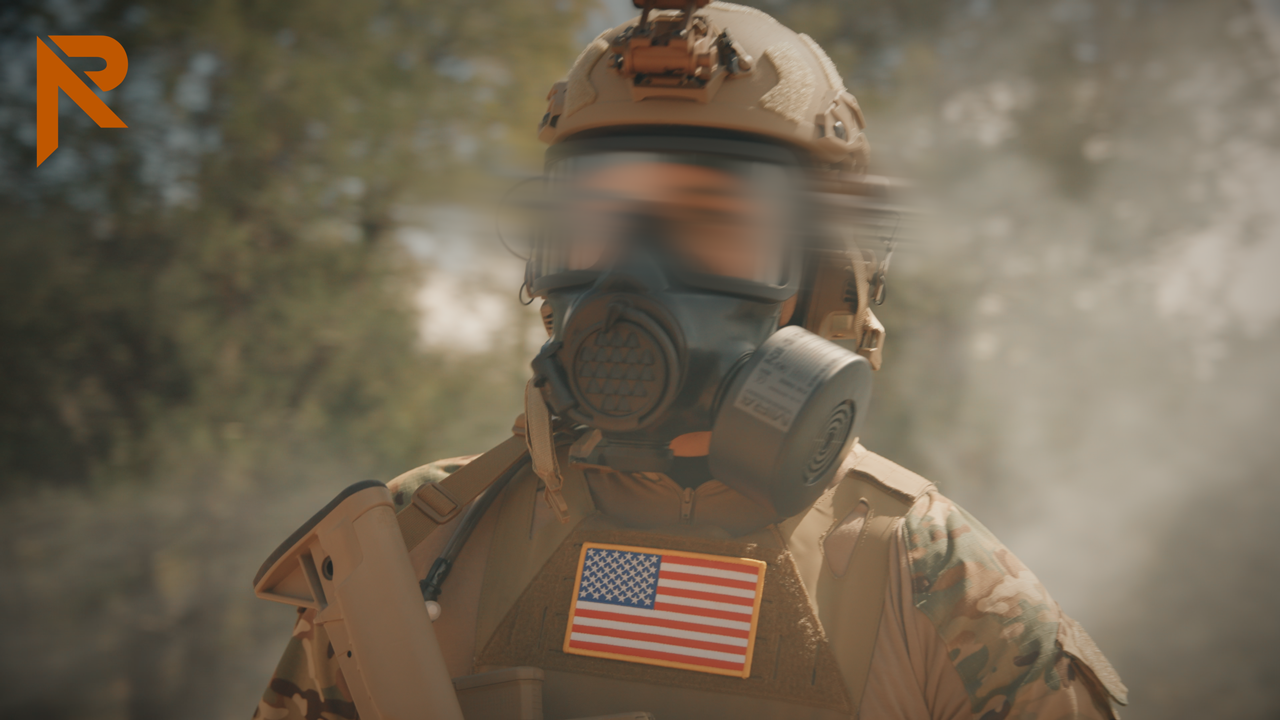 Soilder wearing tactical gas mask in the field
