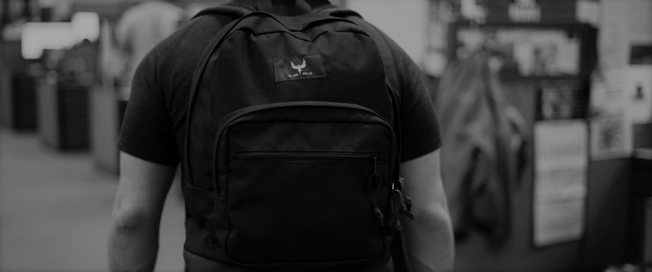 Image of man with armored backpack